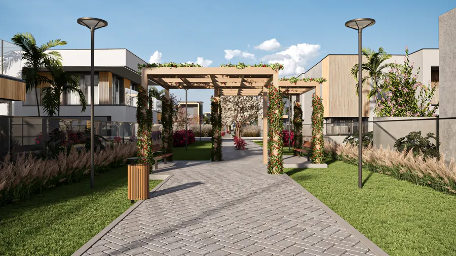 Boulevard arborizado entre os espaços do condomínio Villagio Siena